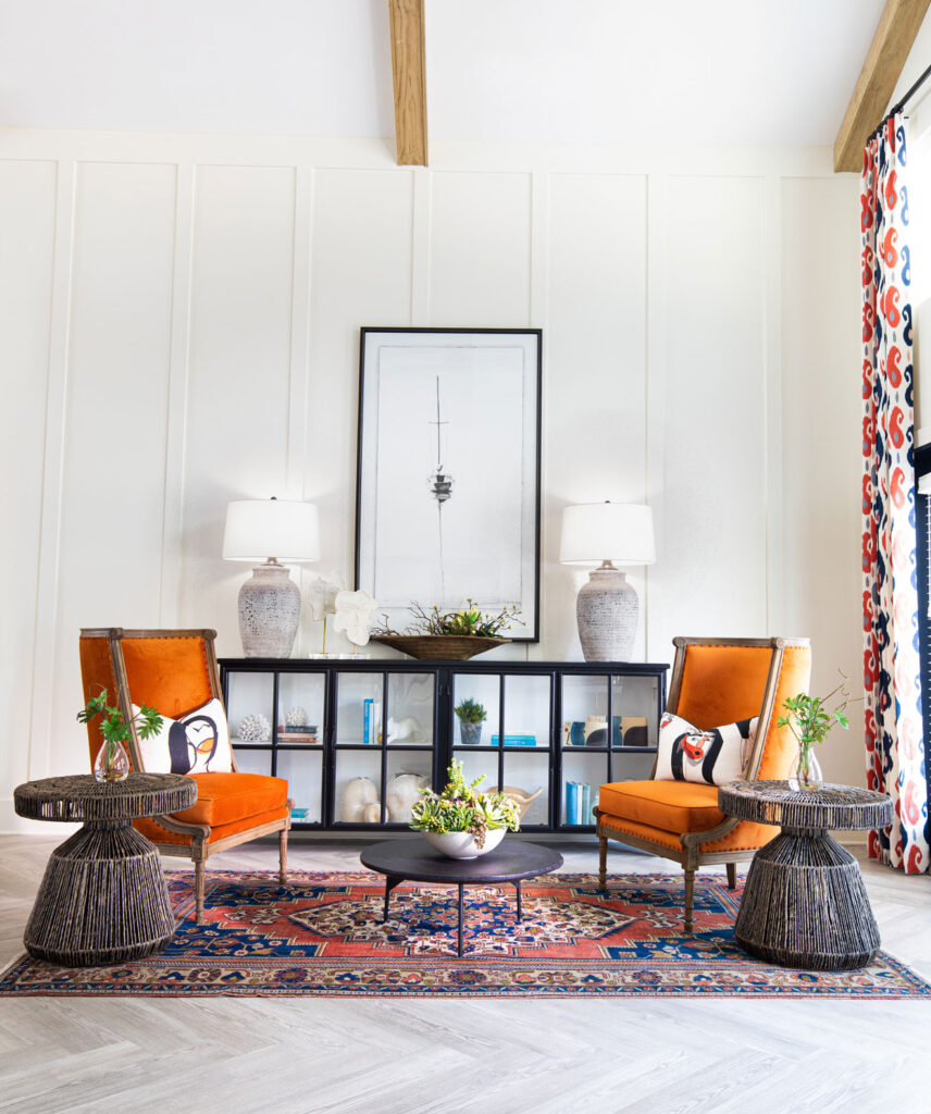 clubhouse area with decorative chairs, wall art, and decor