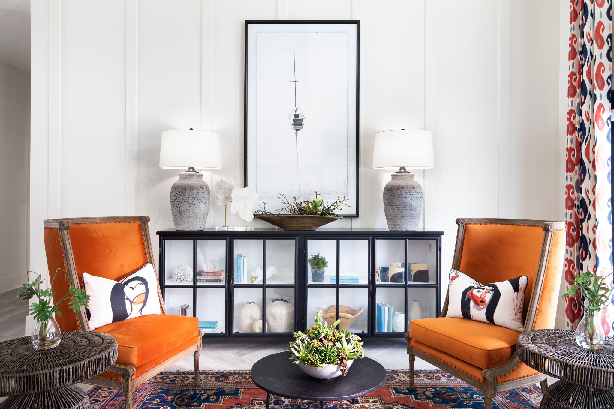 clubhouse area with decorative chairs, wall art, and decor