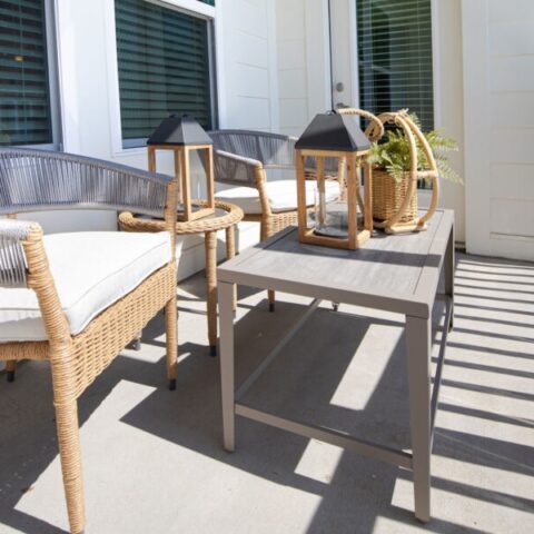 outdoor view of a unit patio with seating and decor